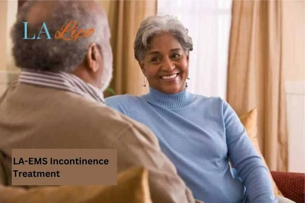 Couple sat smiling at each other - LA-EMS treatment Greater London (Barking and Dagenham)