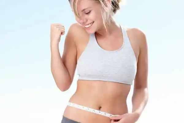 woman happy after fat reduction treatment Greater London (Barking and Dagenham)