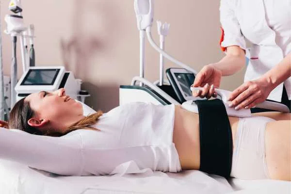 woman having body sculpting to help improve her body image and her mental health Greater London (Barking and Dagenham)